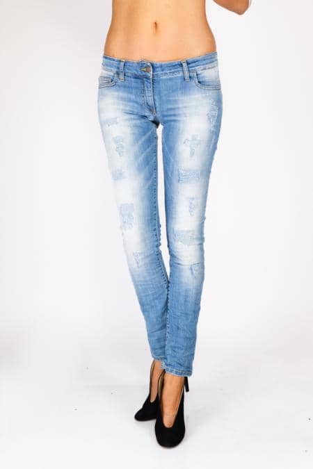 Jeans with rips on the leg.